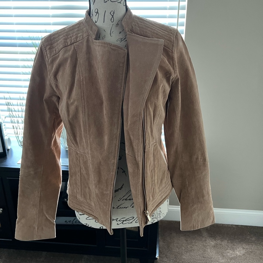Never worn, tan, real leather jacket